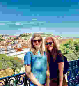 my daughter and I at the São Pedro de Alcântara Miradouro in Bairro Alto
