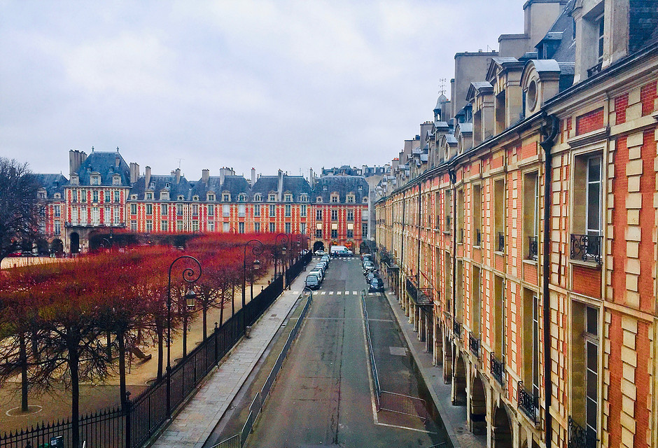 the elegant and classical Place des Vosges in the Marais