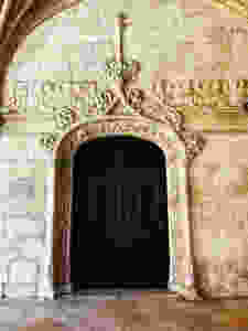 a Manueline door in the cloisters of Jeronimos Monastery in the Belem neighborhood of Lisbon