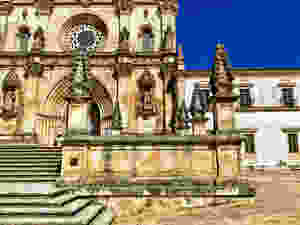 the balcony of the monastery with peculiar looking pinecone type forms