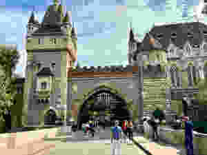 impressive gates marking the entrance to Vajdahunyad Castle