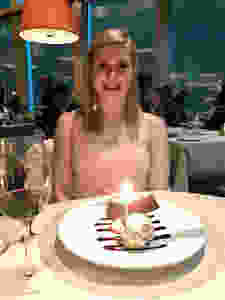 Ali with her chocolate cake. Her one vice is a sweet tooth.