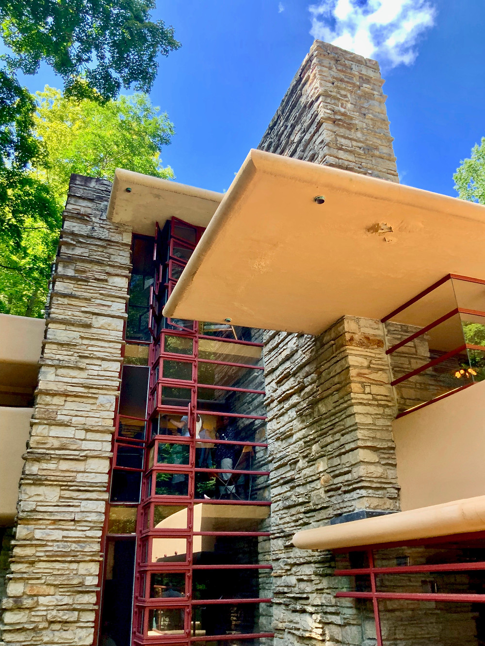 the cornerless windows, in Cherokee Red, on the second and third floor of Fallingwater