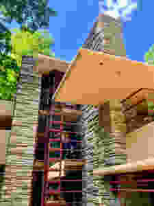 the cornerless windows, in Cherokee Red, on the second and third floor of Fallingwater