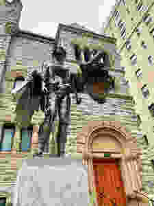 David Altmejd, The Eye -- a four meter tall winged angel-like sculpture in front of the Bourgie Pavilion