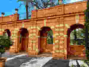 orange grotto walls in the Alcazar Gardens in Seville