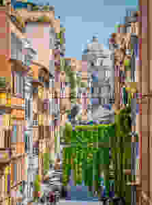 the picturesque Rione Monti in Rome, with the Basilica of Santa Maria Maggiore in the background