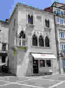 Piran's 15th century Venetian House, which was not red when I saw it in August 2017.