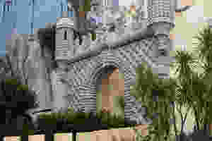 the entrance arch, an exotic studded archway with crenellated turrets