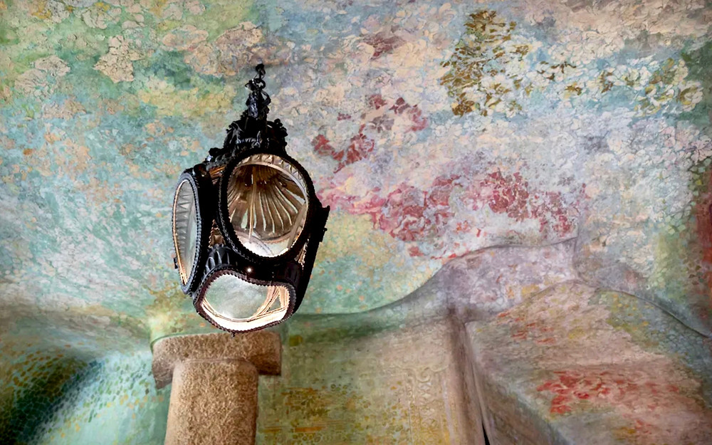 ceiling and wrought iron lamp in La Pedrera