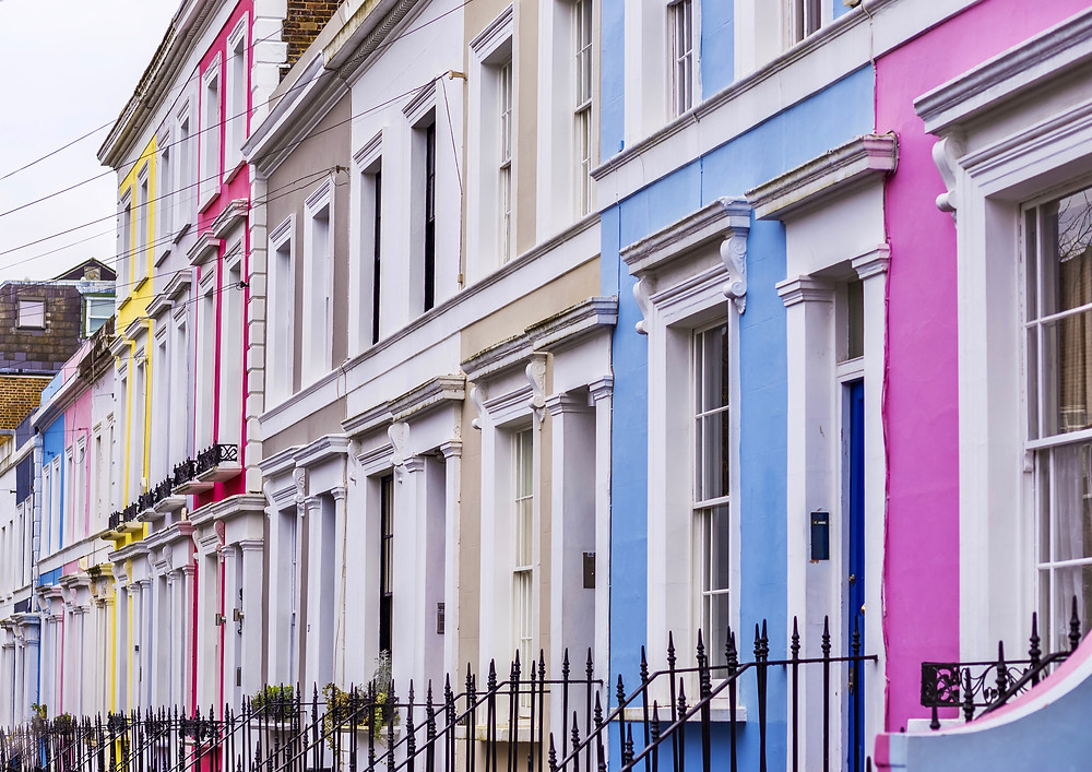 pastel row houses in the Notting Hill neighborhood of west London