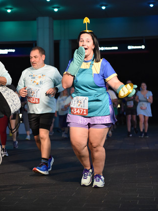 A runner posing as Chef Kronk