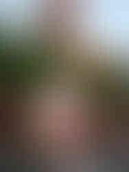 A runner posing in front of the Tower of Terror