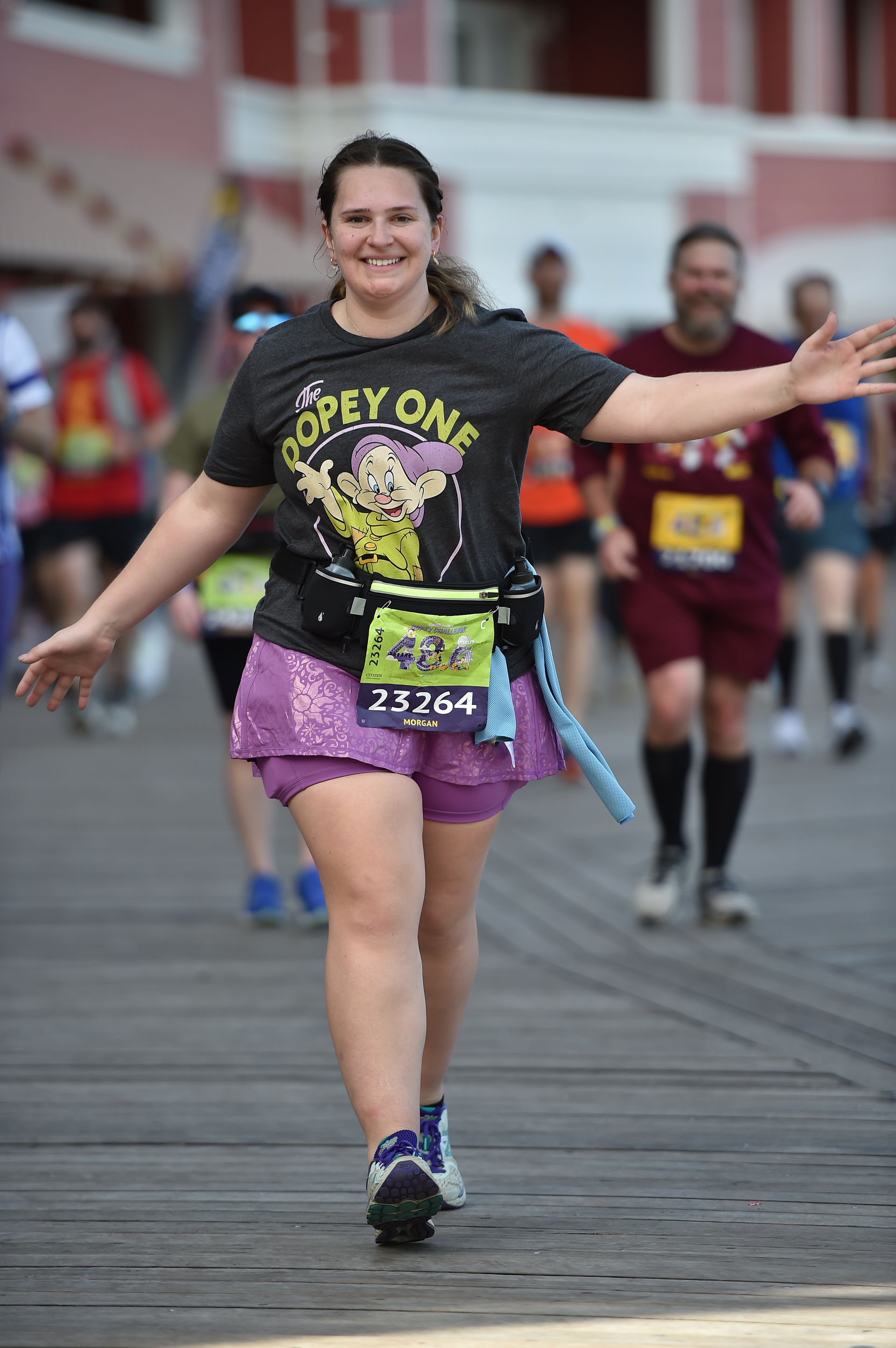 A running posing on Disney's Boardwalk