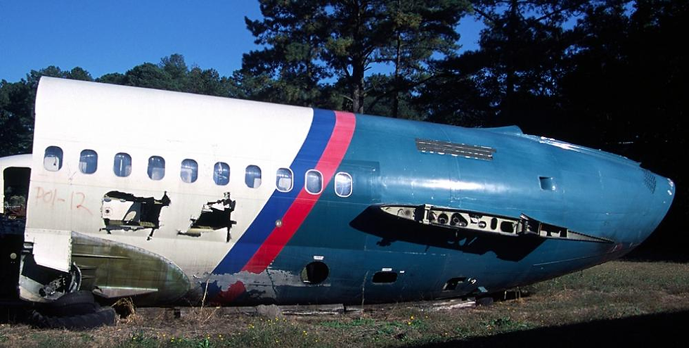 The aft fuselage after the aircraft was stripped for parts. (Source: baaa-acro.com © J.R. Covington, Jr.)