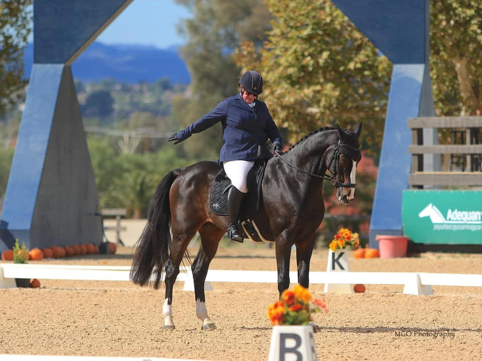 Gina saluting during her final halt in her dressage test with Richie