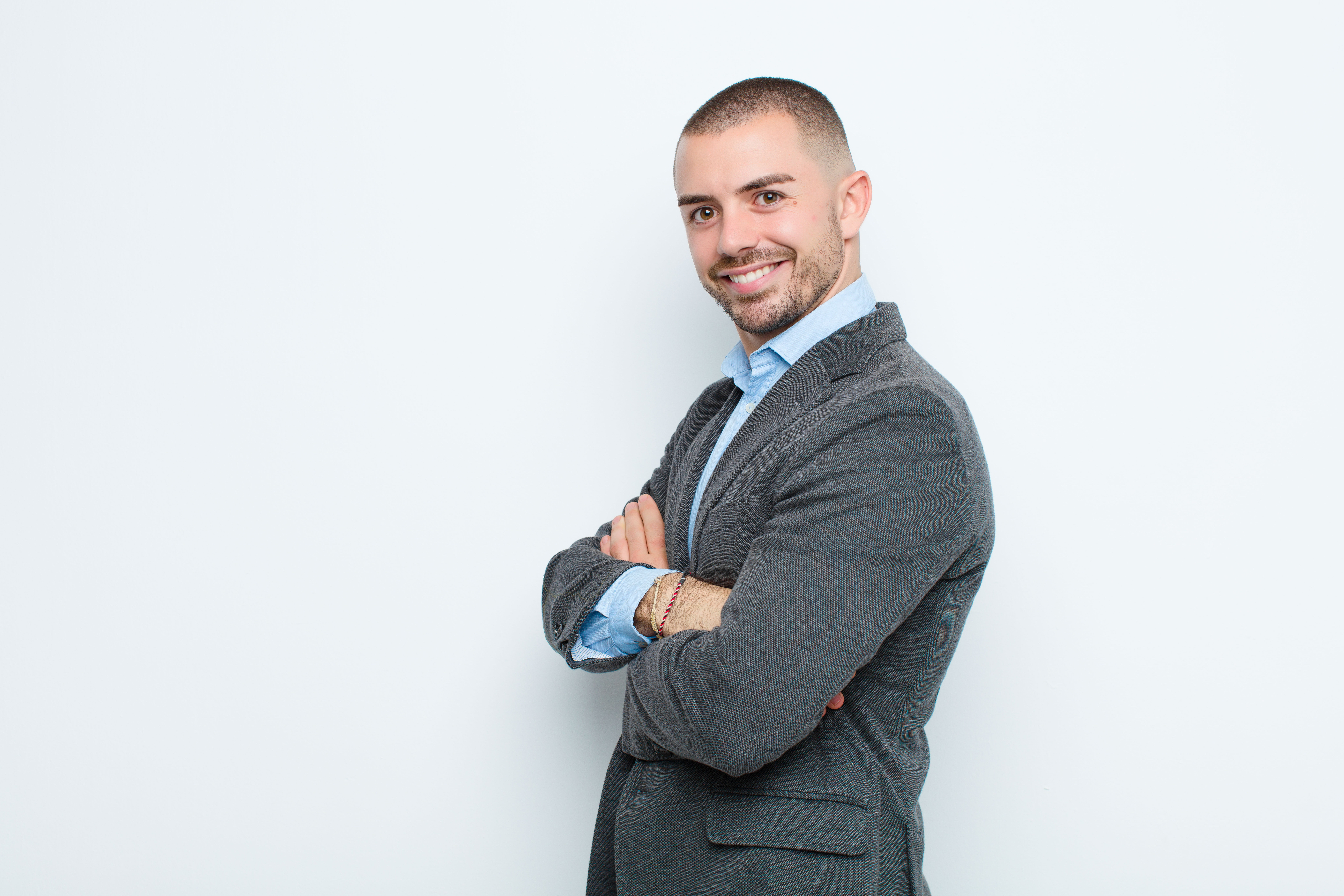 smiling-with-crossed-arms-happy-confident-satisfied-expression-lateral-view.jpg