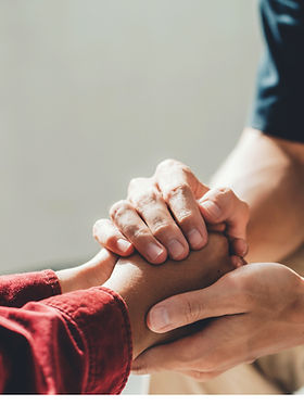 Two people holding hands, just as Joset Rosado will hold your hand while you work through your feelings and finding wellness.