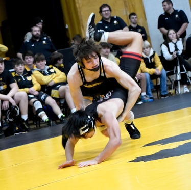 Bulldog Wrestlers Split Home Tri