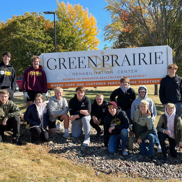 PEM Wrestlers get to work for Community Service Day