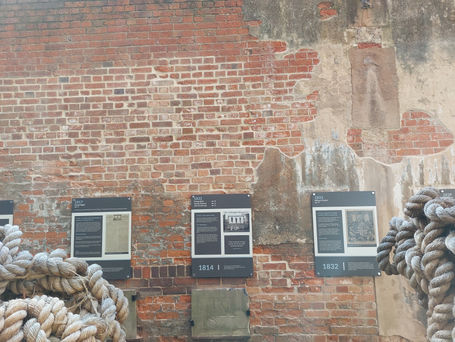 Repaired section of brick wall