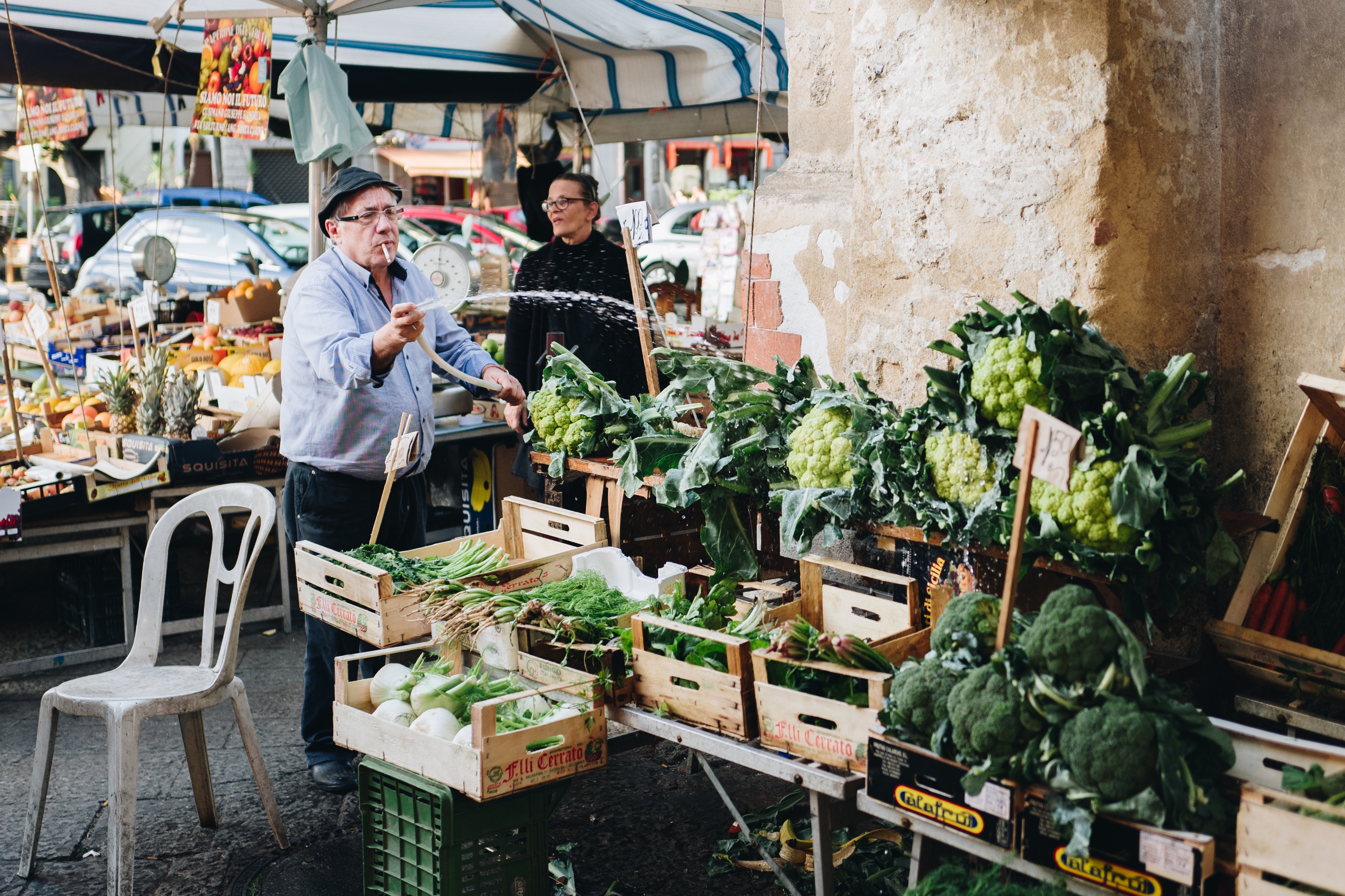 Farm booth provides fresh picked peas, beans, carrots, beets, potatoes, fresh cut flowers, radishes, kale, and onions.