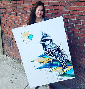 Artist hold painting of a Bird
