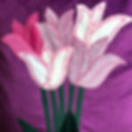Luxury handmade velvet cushion with tulip design in pinks white and green close up