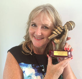 Alison Cowell with radio award.jpg