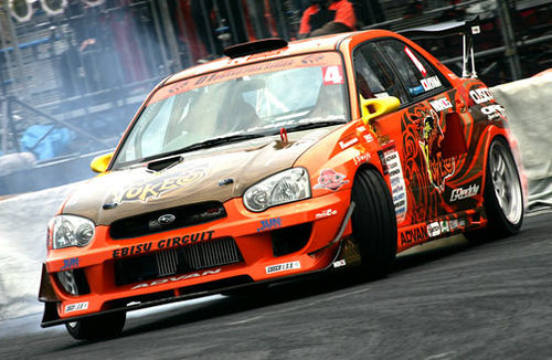 subaru impreza orange.jpg