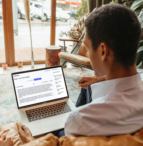 mockuuups-man-using-a-macbook-pro-mockup