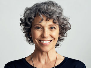Older professionals collaborating and contributing in the workplace