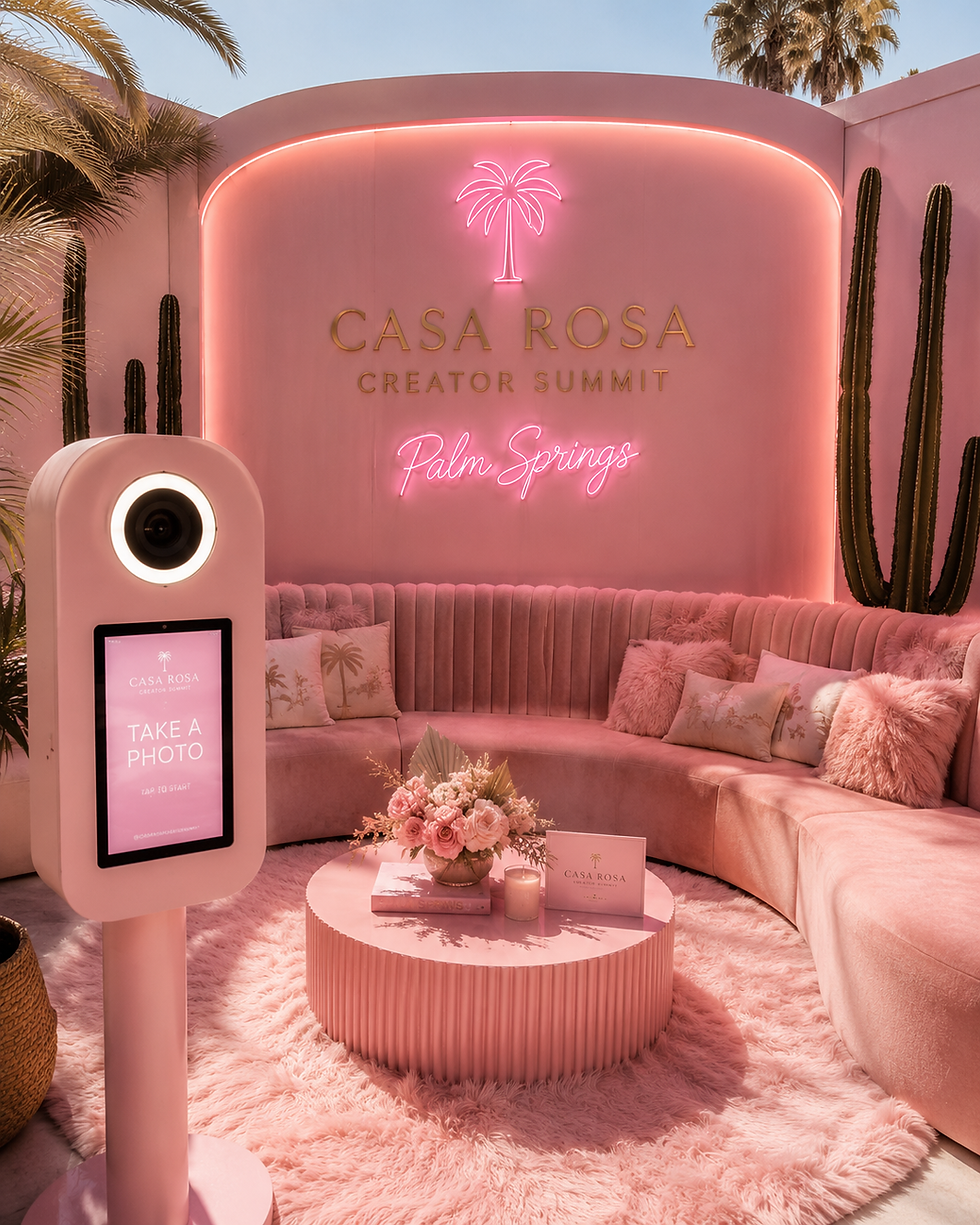 Casa Rosa Creator Camp: pink lounge with a neon sign and a branded photo booth