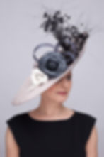 Elene large hatinator with leather camelias and feather spray