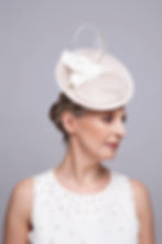 Celeste small tilted saucer hat with curled quills and camelia - side view