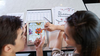 Couple creating a typical wedding budget