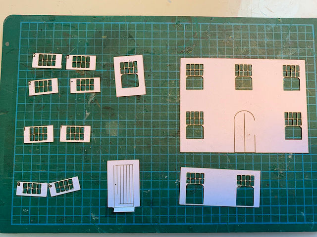 Laser-cut card for the windows and doors