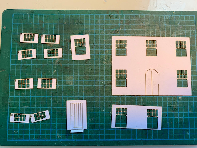 Laser-cut card for the windows and doors