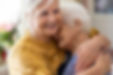 2 senior women embracing each other | iStock-1248779487.jpg