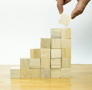 Wooden blocks stacked into steps
