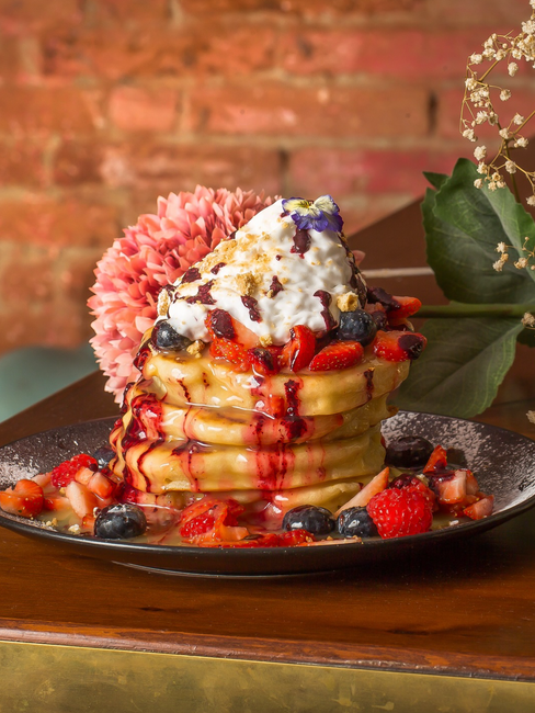 Fruity pancakes at brunch spot at Cremat 11 in Barcelona