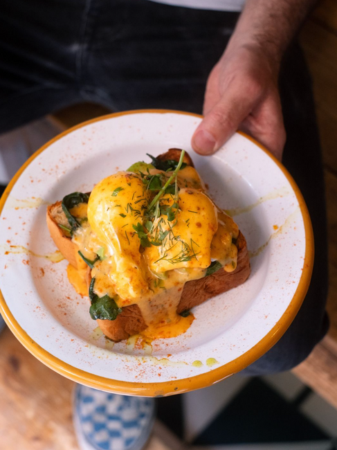Eggs Benedict toast at Caravelle brunch Barcelona