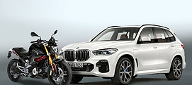 Black motorcycle and white SUV parked side by side on a gradient background