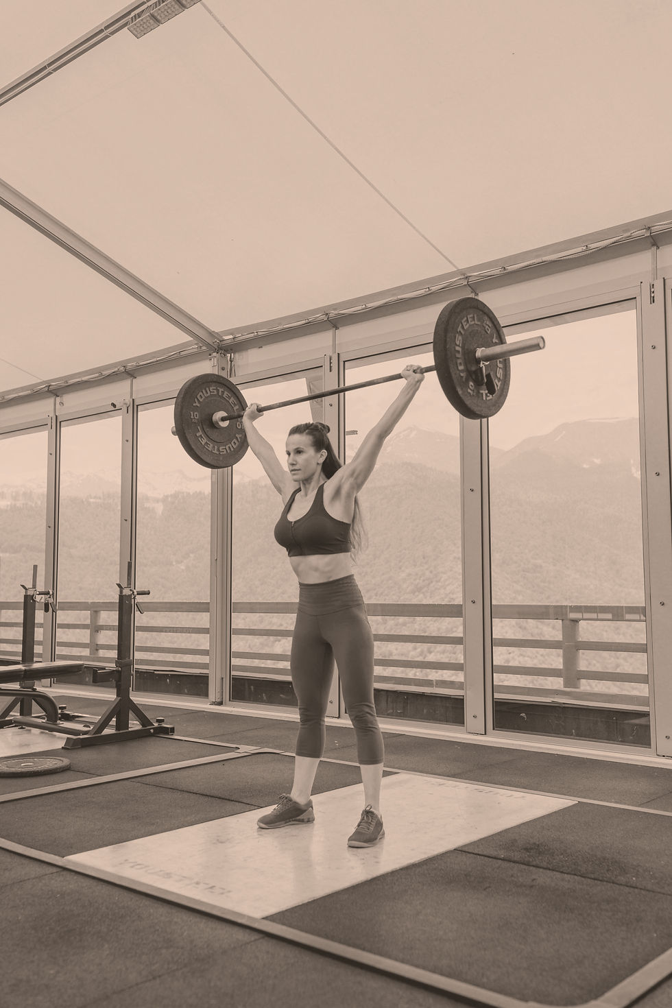 Athlete using push press exercise to develop power