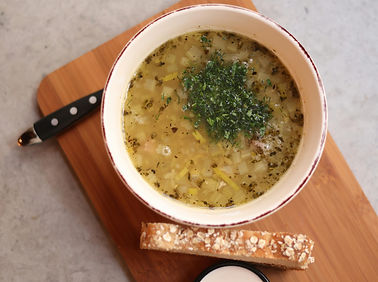 Mushroom soup with bread and seasoning