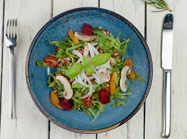 oyster mushroom salad in a ceramic bowl
