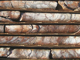Bell Copper Drills Strong Leached Cap in Porphyry at Big Sandy