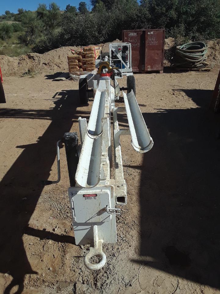 Press for extruding core from tube
