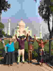 Smiling Family in front of the Taj Mahal.