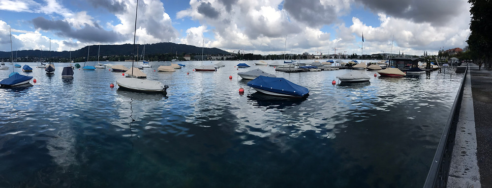 Boats and clouds at the Zurich See (lake)